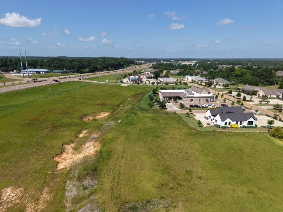Aerial view of a graded commercial lot ready for development
