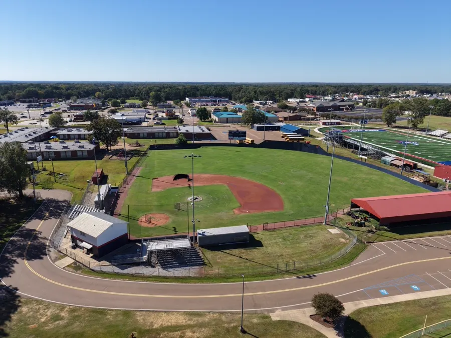Aerial view of a baseball field within a community athletic complex