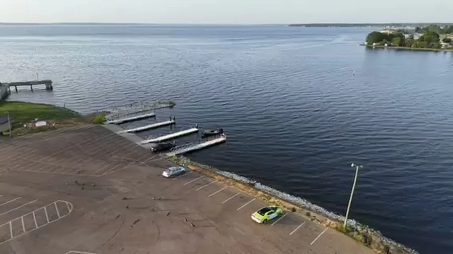 Aerial view of boat docks extending into open water